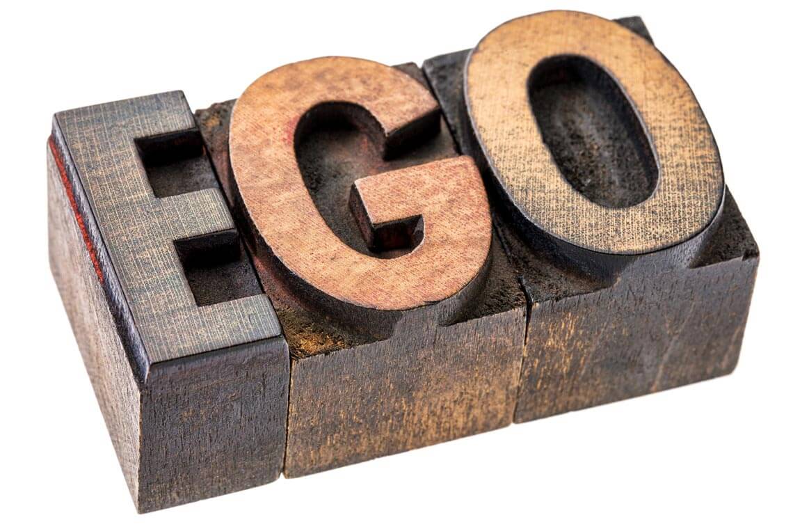 ego spelt with wooden letter blocks